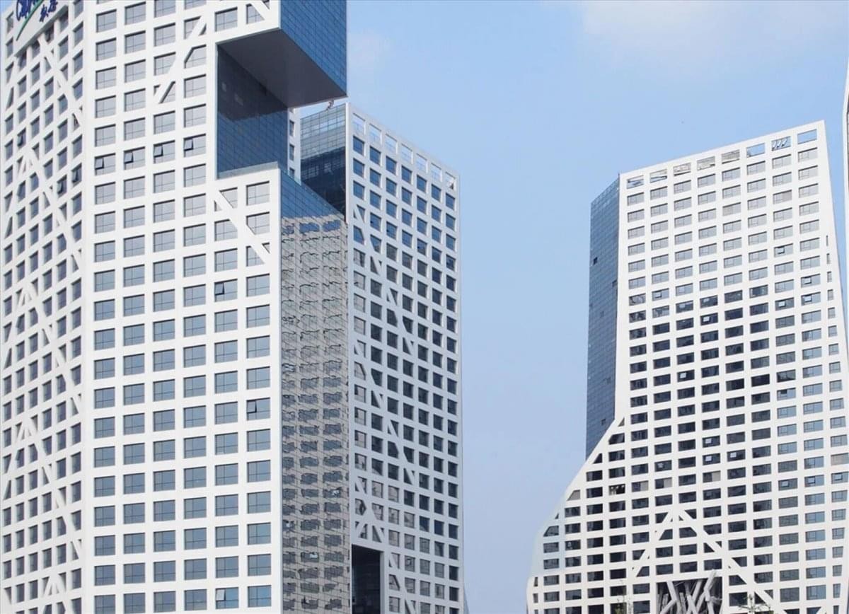 Exterior view of the modern geometric facade at Lebourgneuf Business Centre, Suite 400.