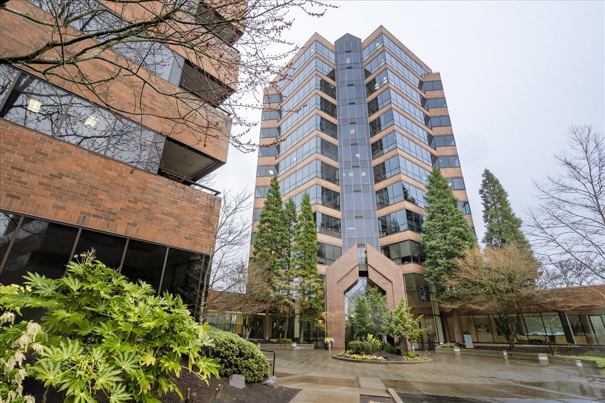 Exterior view of the multi-story brick and glass facade at Lincoln Center.