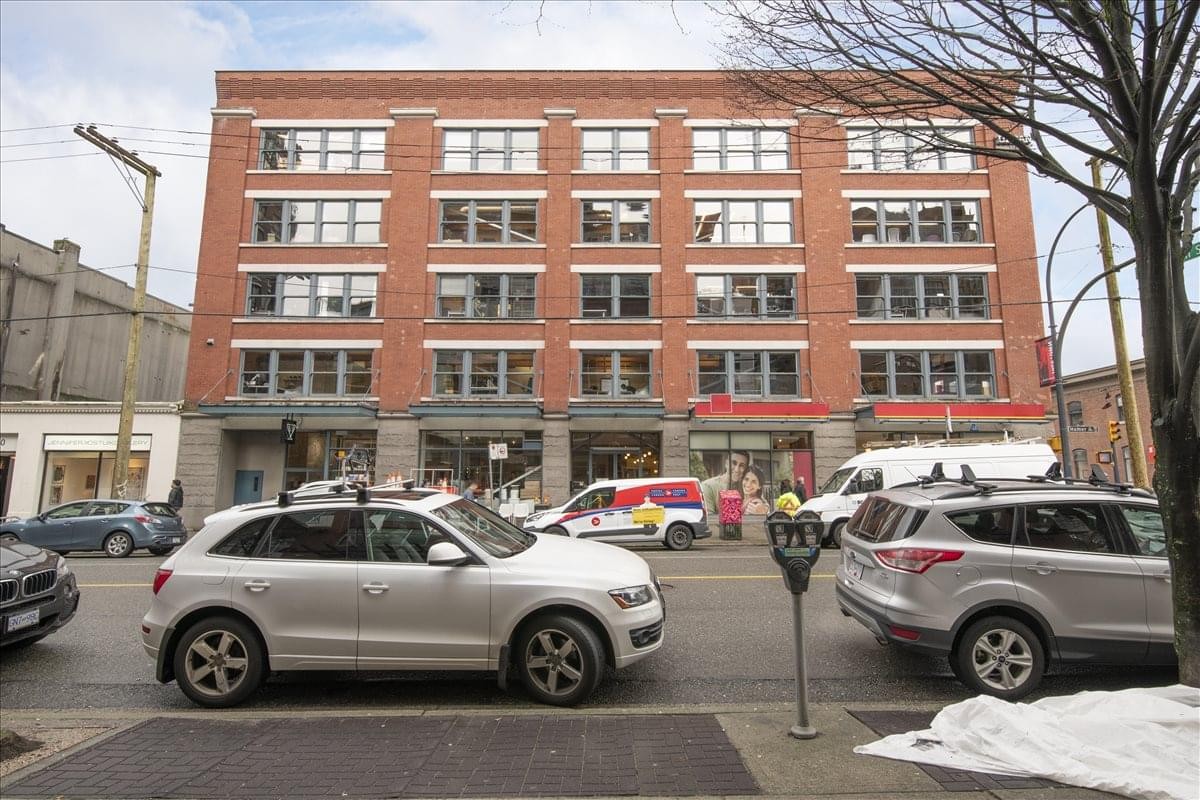 Exterior view of the brick facade building at 1090 Homer Street, Suite 300.