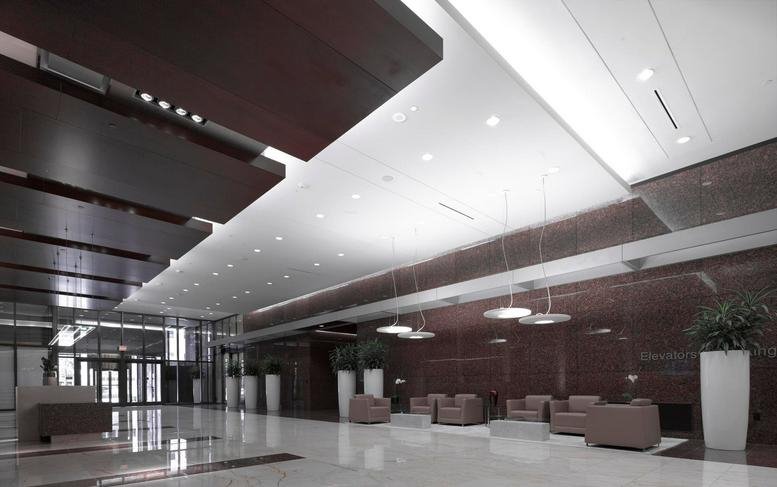 Bright, modern lobby with polished floors and comfortable seating areas.