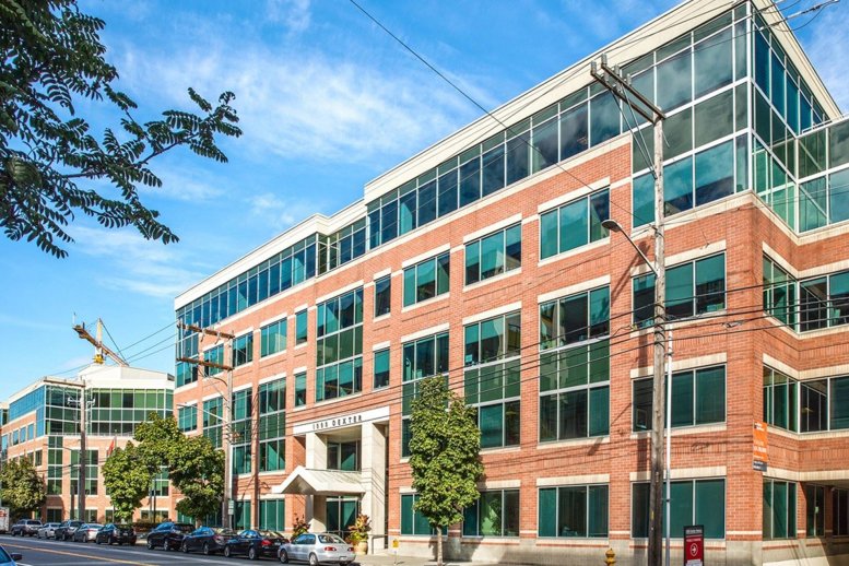 Exterior view of the brick and glass Industrious Lake Union at 1100 Dexter Ave N.