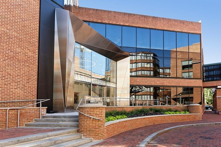 Exterior view of the brick facade and modern glass entrance at 1101 30th Street NW.