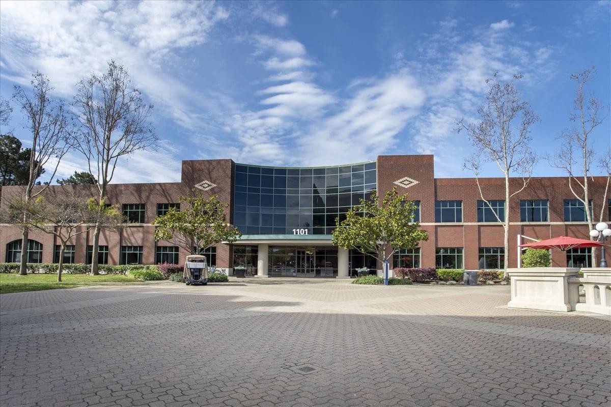 Exterior facade of the brick and glass building at 1101 Marina Village.