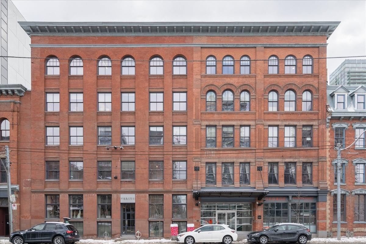 Exterior view of the historic red brick facade at Queen & Richmond Centre.