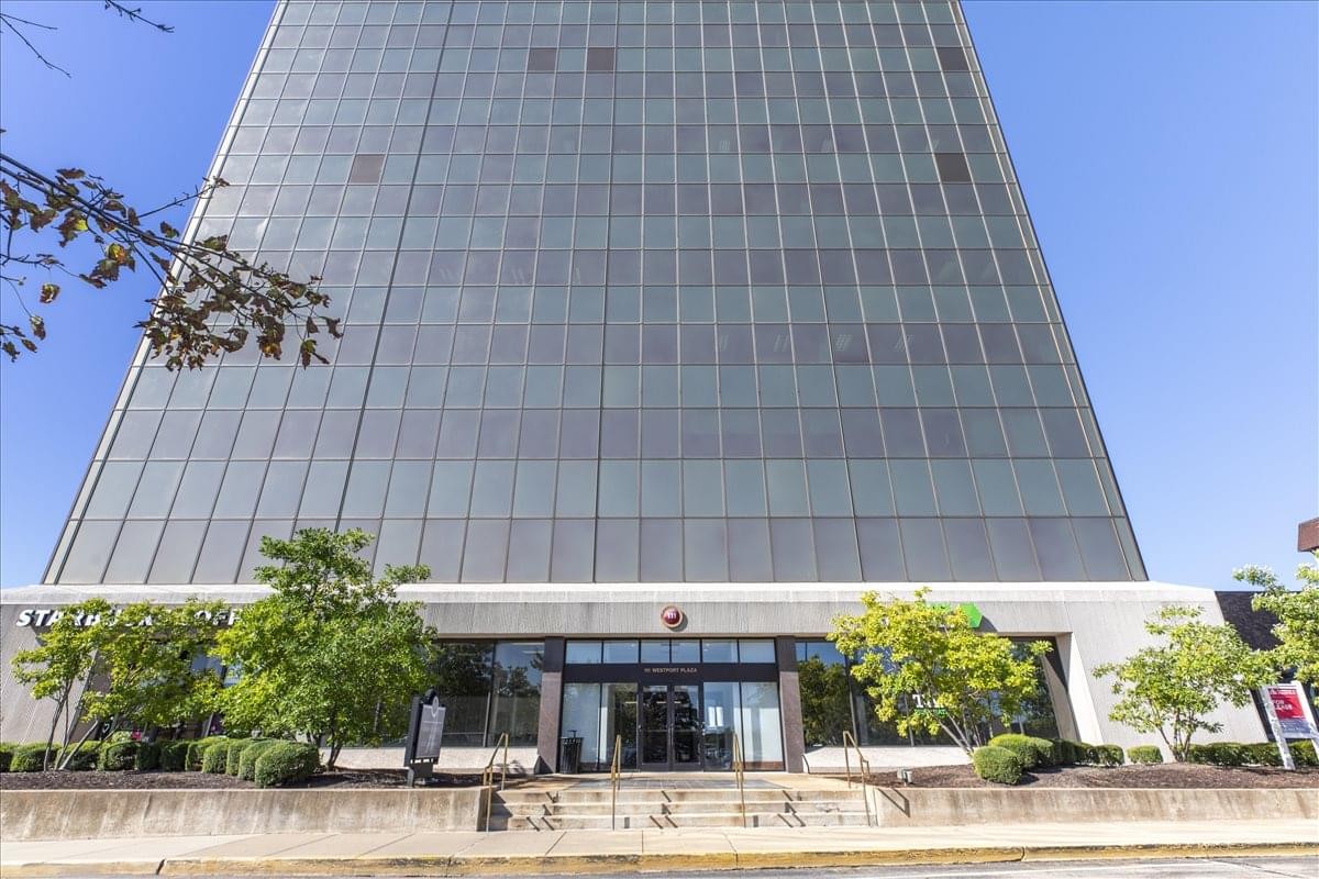 Exterior view of the glass skyscraper facade at 111 West Port Plaza.