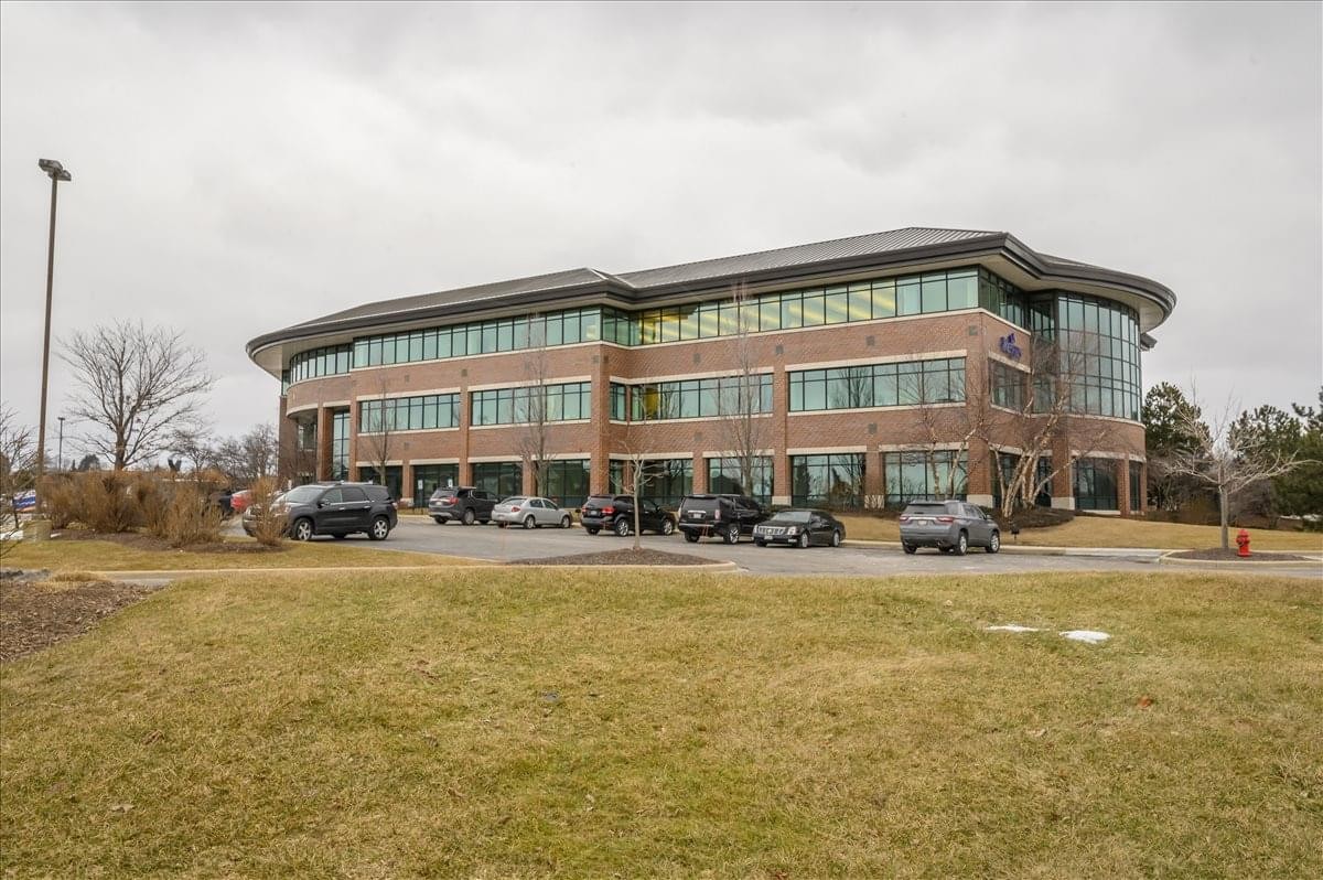 Exterior view of the brick and glass office building at 11414 W. Park Place.
