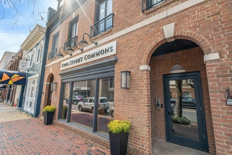 Brick facade and entrance of King Street Commons, 118 North Saint Asaph Street.