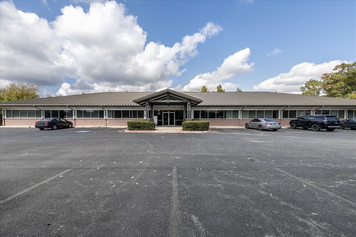 Exterior view of the low-rise office building at 1202 North East McClain Road, Building 7, Beau Terre.