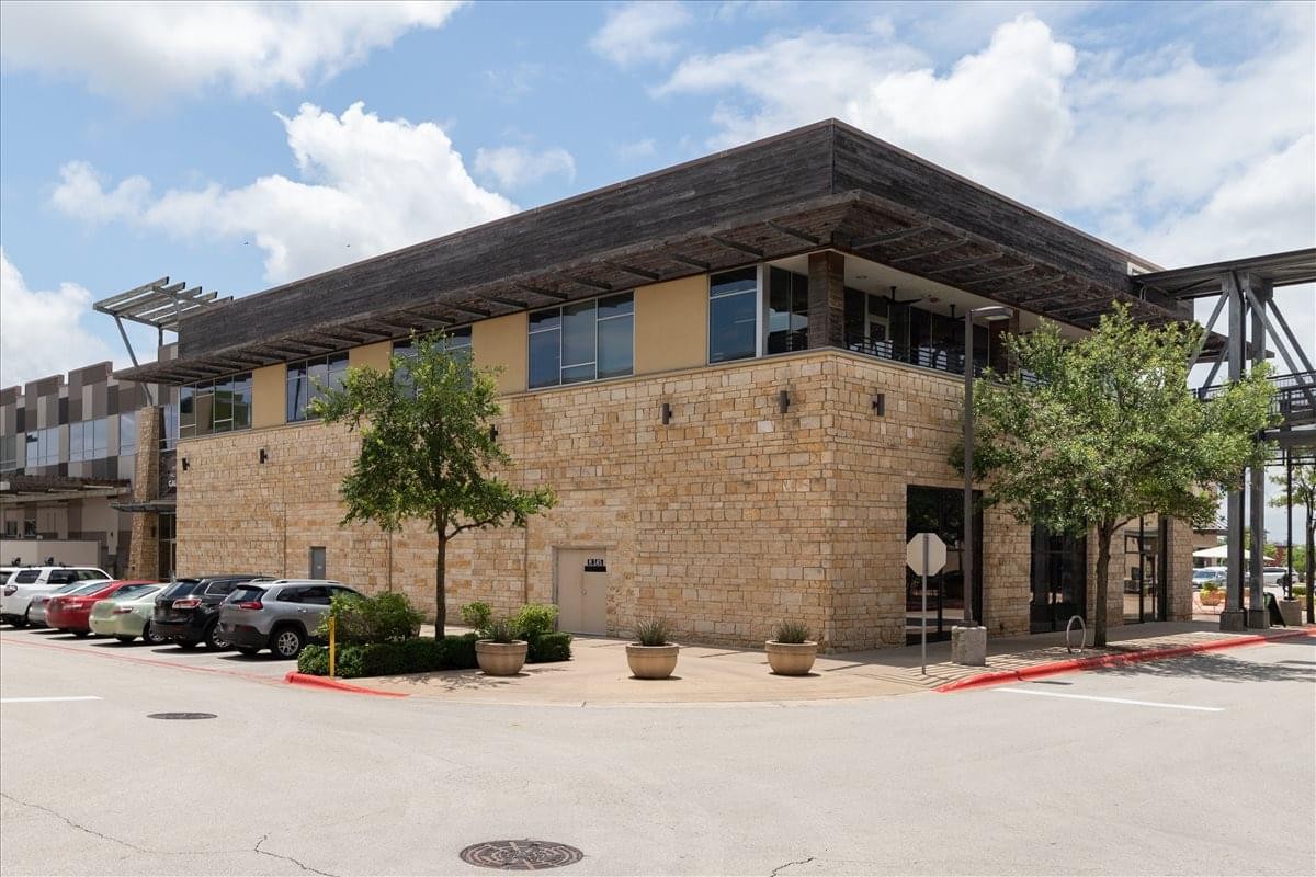 Stone facade exterior of the 12600 Hill Country Boulevard, Suite R-275, Hill Country Galleria building.