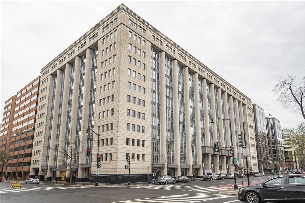 Grand neoclassical exterior facade of the 1300 I Street NW building.