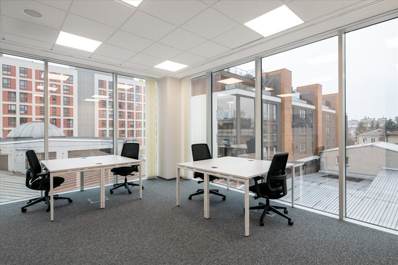 Spacious open-plan workspace at 1335 Canton Road, 1st Floor, East Cobb with large windows and city views.