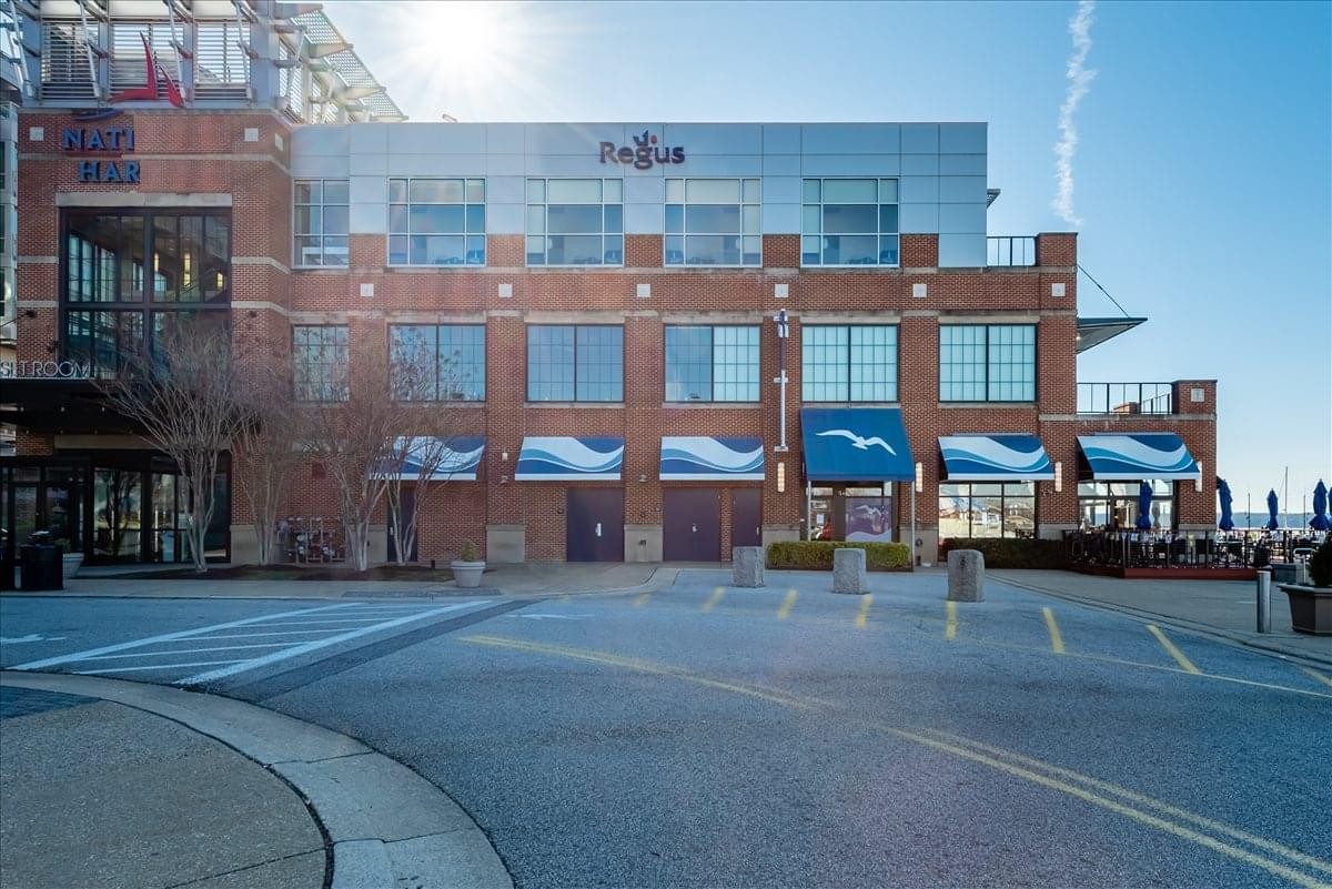 Exterior brick facade of 137 National Plaza, Suite 300, National Harbor, Maryland, USA.