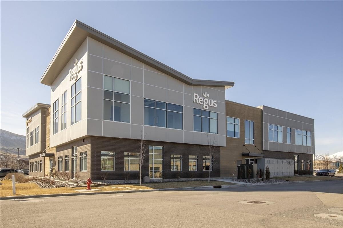 Exterior view of the modern two-story building at 13894 South Bangerter Parkway, Suite 101.