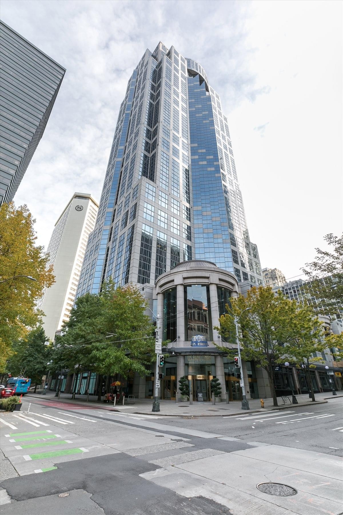 Exterior view of the soaring glass and stone facade of Downtown Seattle Center at 1420 Fifth Avenue.