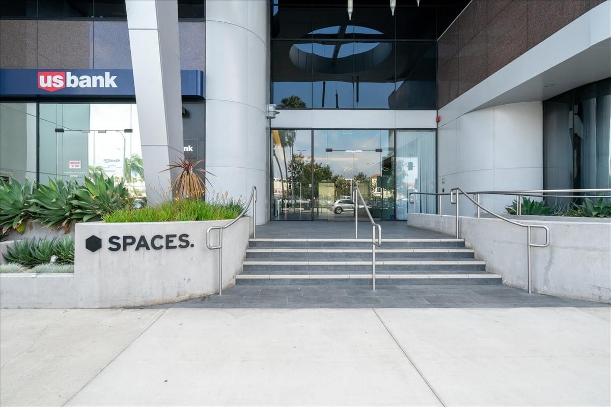 Exterior entrance of 145 South Fairfax Avenue, Suite 200 & 300 showing the US Bank and Spaces signage.