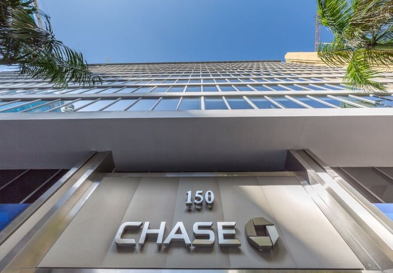 Exterior building view of 150 South East 2nd Avenue featuring the Chase bank entrance.
