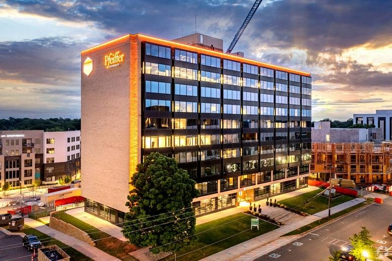 Exterior sunset view of the modern multi-story office building at 1515 Mockingbird Lane.
