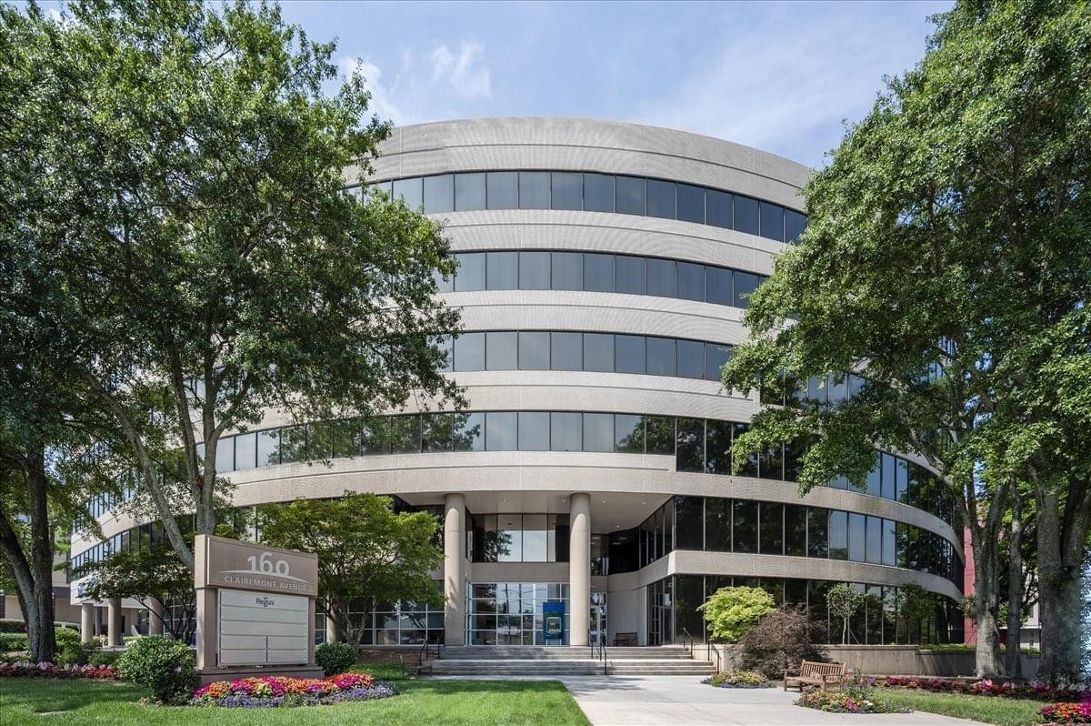 Exterior view of the curved facade at Clairemont Avenue Business Centre.