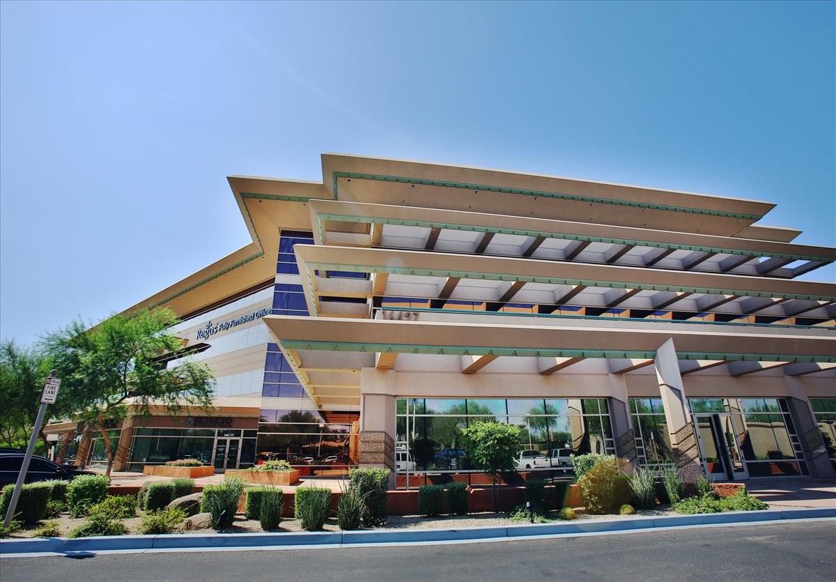 Exterior view of the contemporary multi-story building at 16427 North Scottsdale Road, Suite 410.