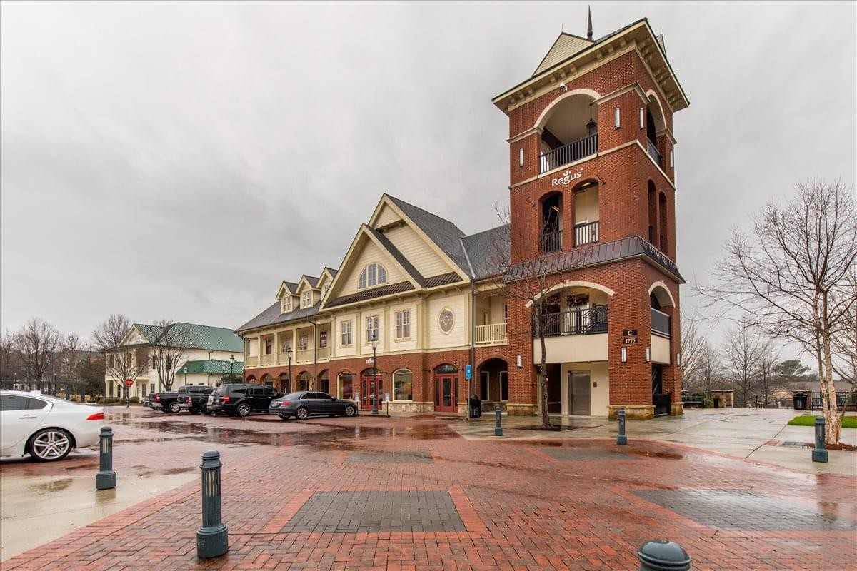Exterior view of the traditional brick clocktower building at 1775 Parker Road, Building C.