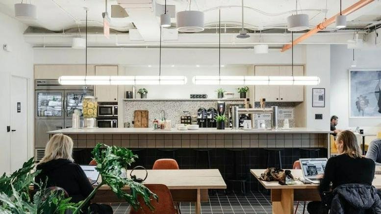 Spacious coworking kitchen and cafe area at 18 West 18th Street, New York City.