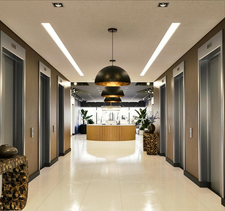 Modern elevator lobby at 1801 West End Avenue, Suite 1000, with wood paneling and pendant lights.