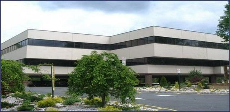 Exterior view of the low-rise office building at 181 New Road, Suite 304, Parsippany.