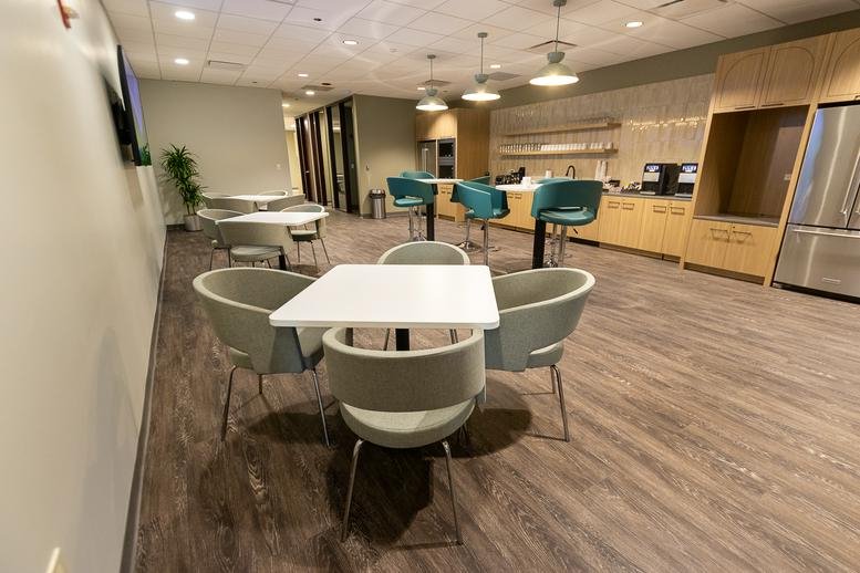 Professional reception lobby at 181 West Madison, Chicago featuring warm lighting and modern seating.