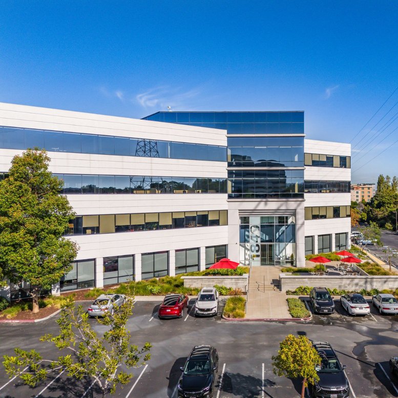 Modern glass and white facade exterior of 1840 Gateway Drive, Suite 400, Bayfront.