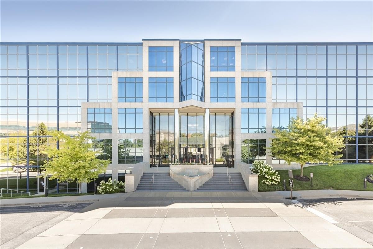 Exterior view of the modern glass-fronted building at 2 City Place Drive.