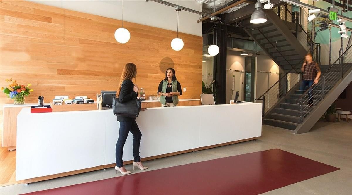 Spacious wood-paneled reception area at 2 North Central Avenue.