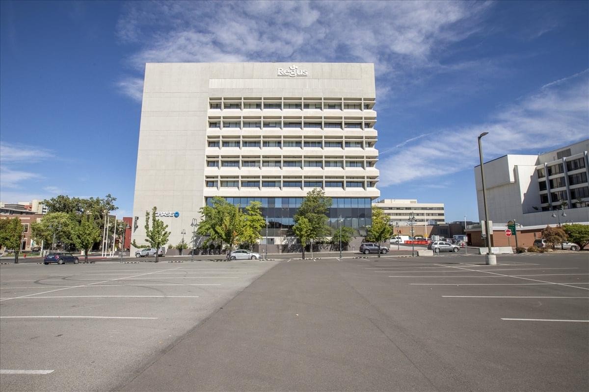 Exterior view of the white high-rise building at 200 S. Virginia.