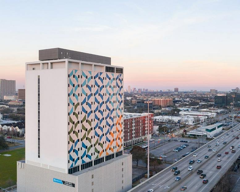 Exterior view of the colorful geometric facade at 2000 Crawford Street.