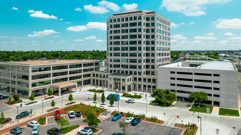 Exterior view of the multi-story 2000 S. Colorado Boulevard Tower One against a blue sky.