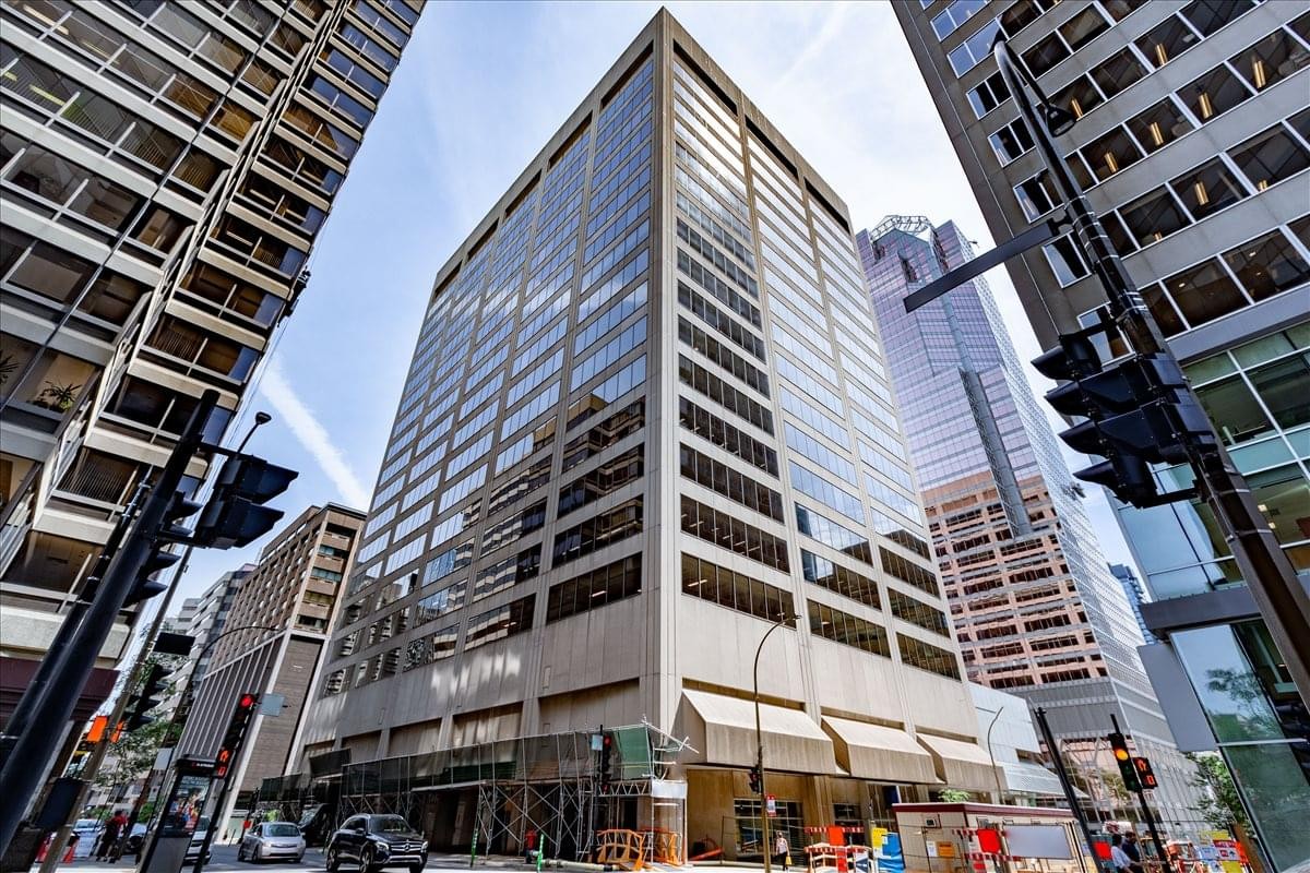 Street view of the modern high-rise office building at 2001 University Street.