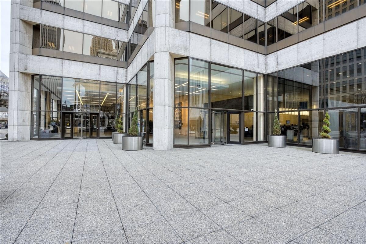The glass and stone entrance of the PNC Center at 201 East Fifth Street.