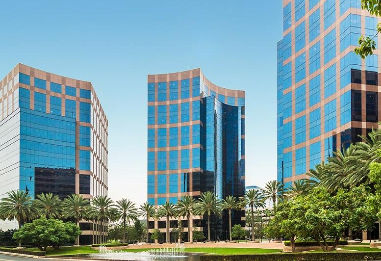 Exterior view of the blue glass facade at the Wells Fargo Building.