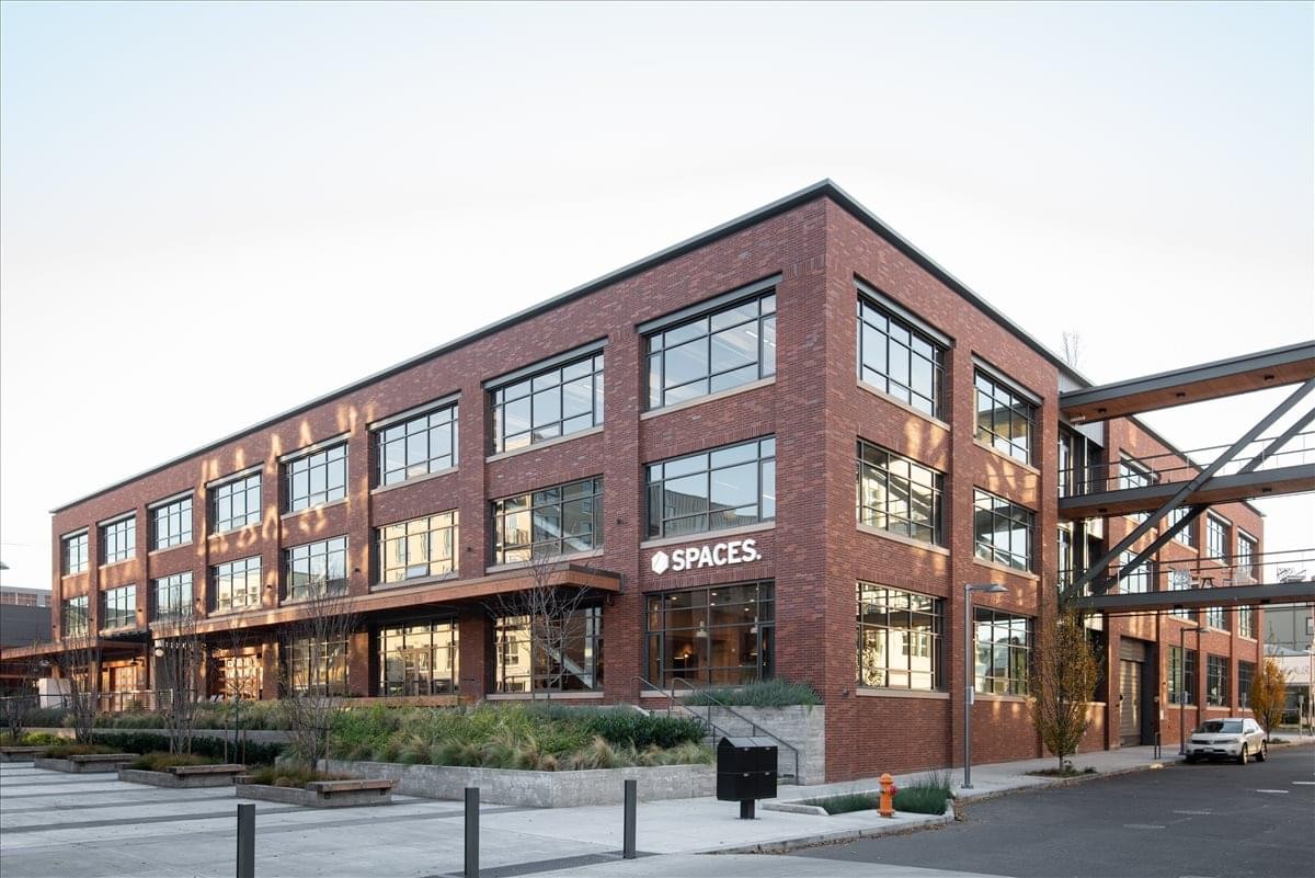 Exterior view of the brick-facade building at 2175 NW Raleigh Street, Portland (Oregon).