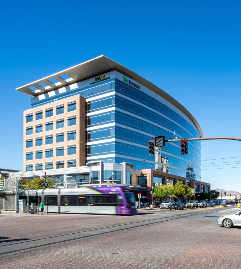 Exterior view of the contemporary glass and brick facade at 222 South Mill Avenue, Tempe, Arizona.