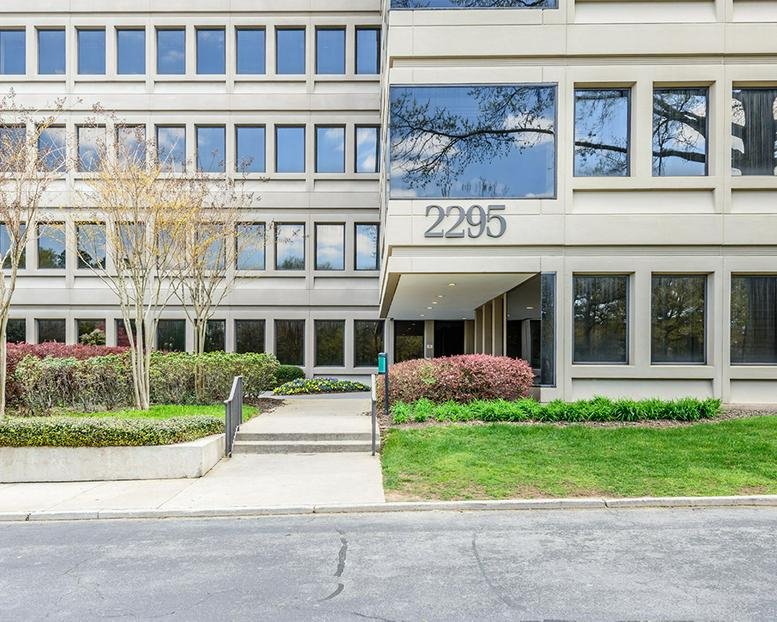 Exterior facade of the low-rise office building at 2295 Parklake Drive.