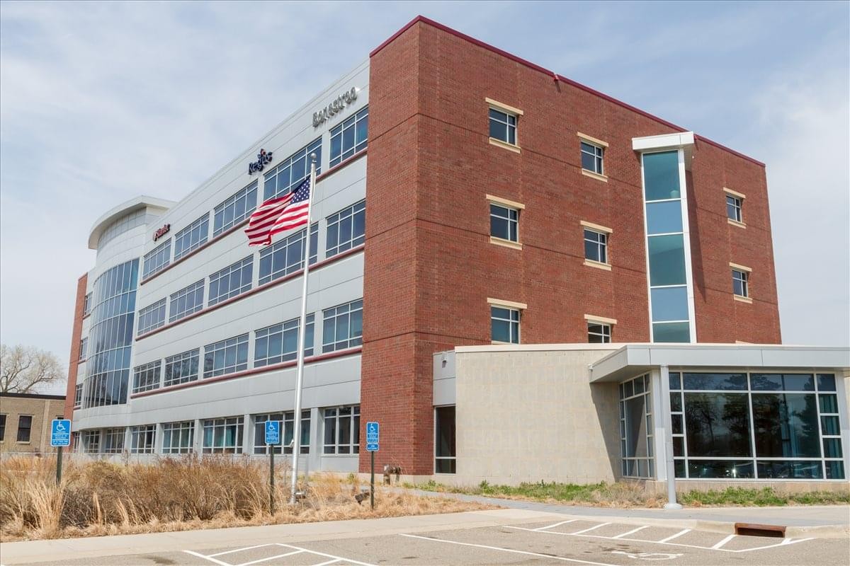 Exterior view of the brick and glass facade building at 2355 Highway 36 West.