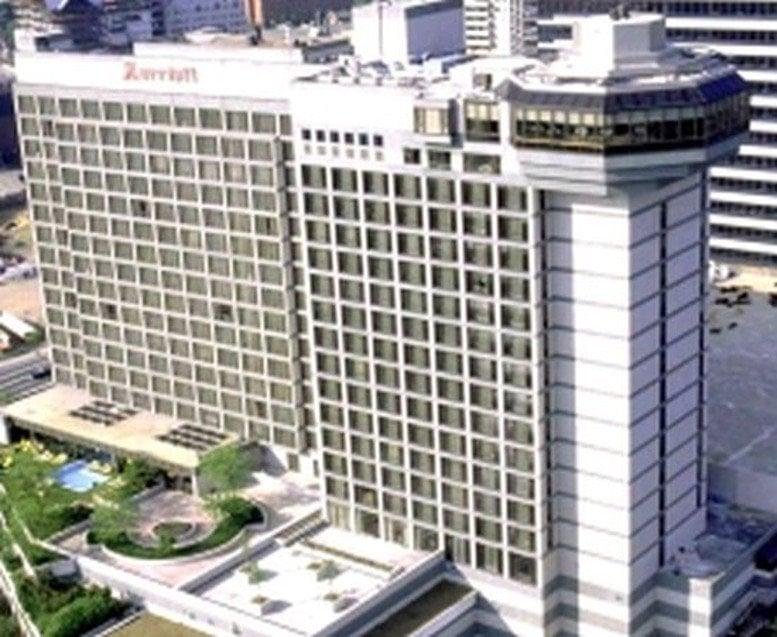 Exterior view of the Marriott building at 243 Tresser Boulevard with its distinctive tiered facade.