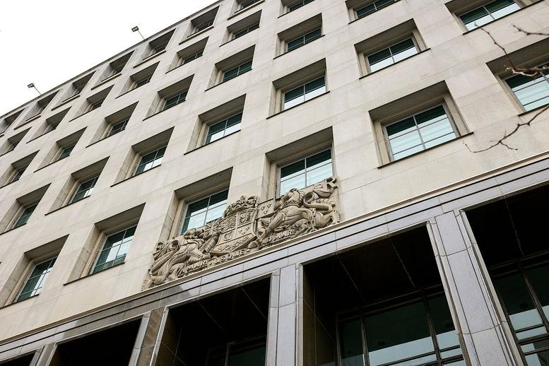 Exterior view of the stone facade building at 250 University Avenue.