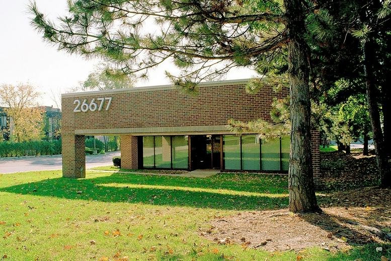 Exterior view of the brick facade building at 26677 West Twelve Mile Road.