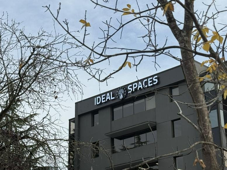 Exterior view of the dark grey facade at Wilburton Ridge Office Park, Bellevue, Washington.