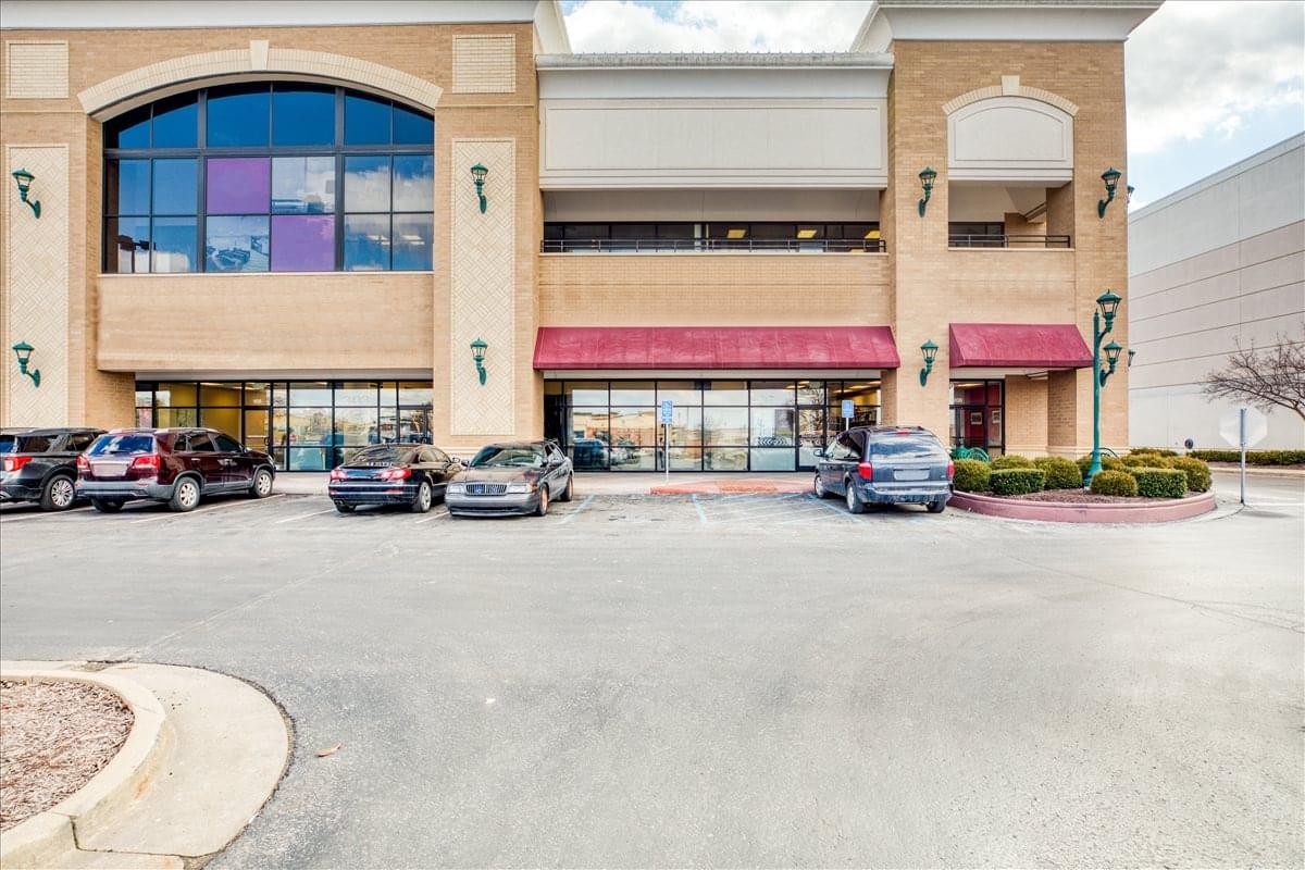 Exterior view of the brick and glass building at 303 N. Stadium Blvd.