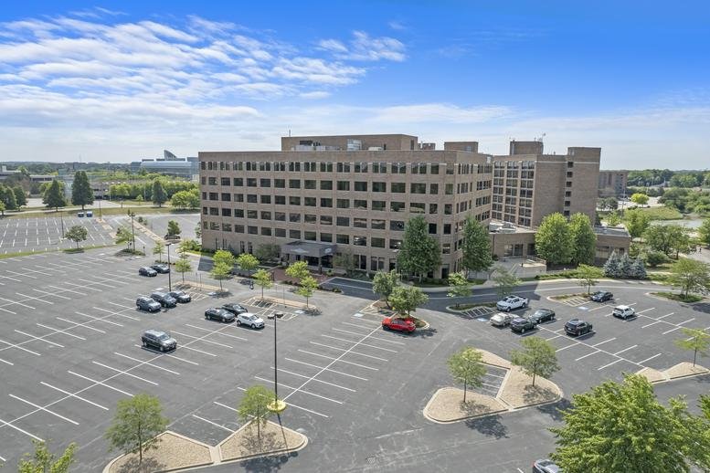 Aerial exterior view of the multi-story office building at 3030 Warrenville Road.