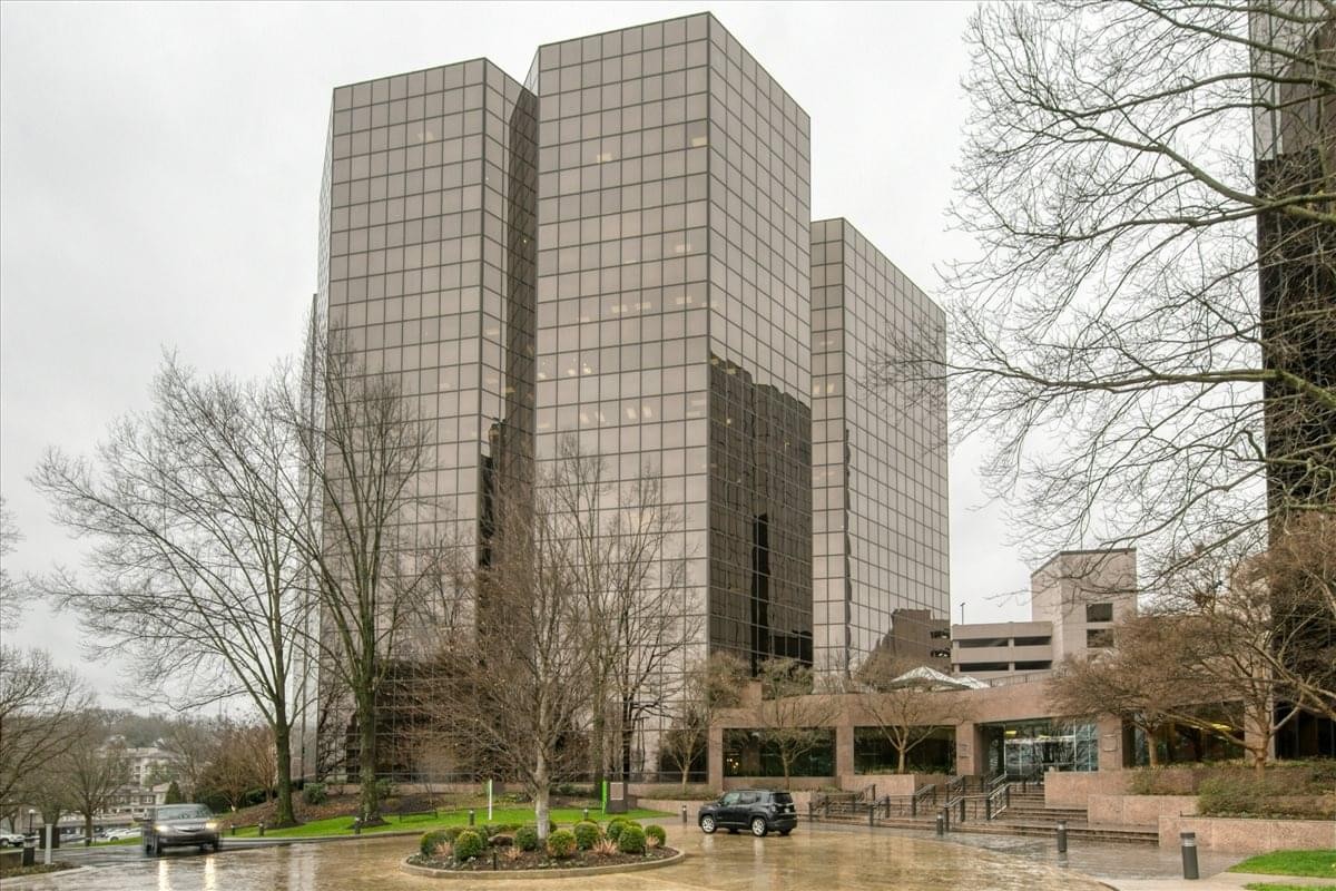 Exterior view of the multi-story glass buildings at American Centre.