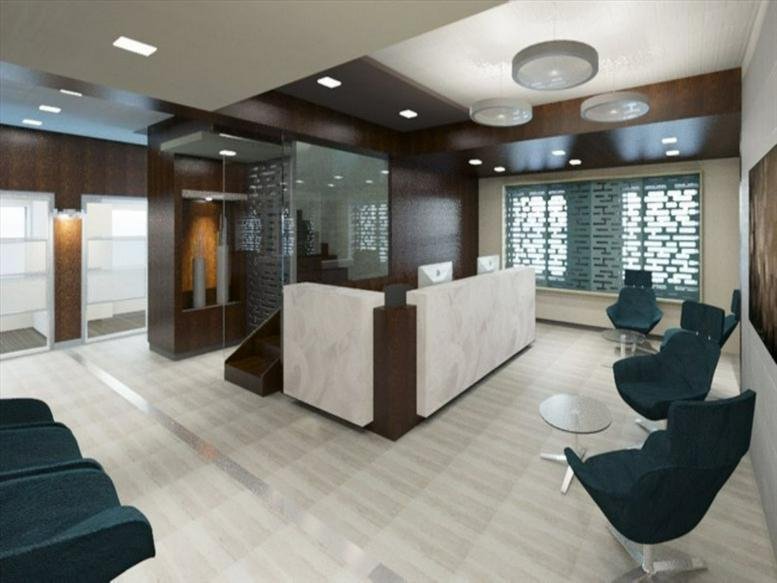 Bright lobby of 315 Madison Avenue, 3rd and 4th Floor, with marble reception desk and teal armchairs.