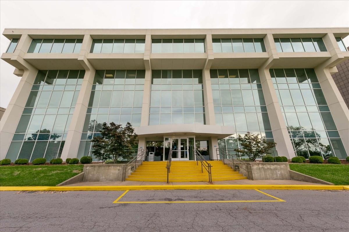 Exterior facade of the glass and concrete West End Center at 3200 West End Avenue.